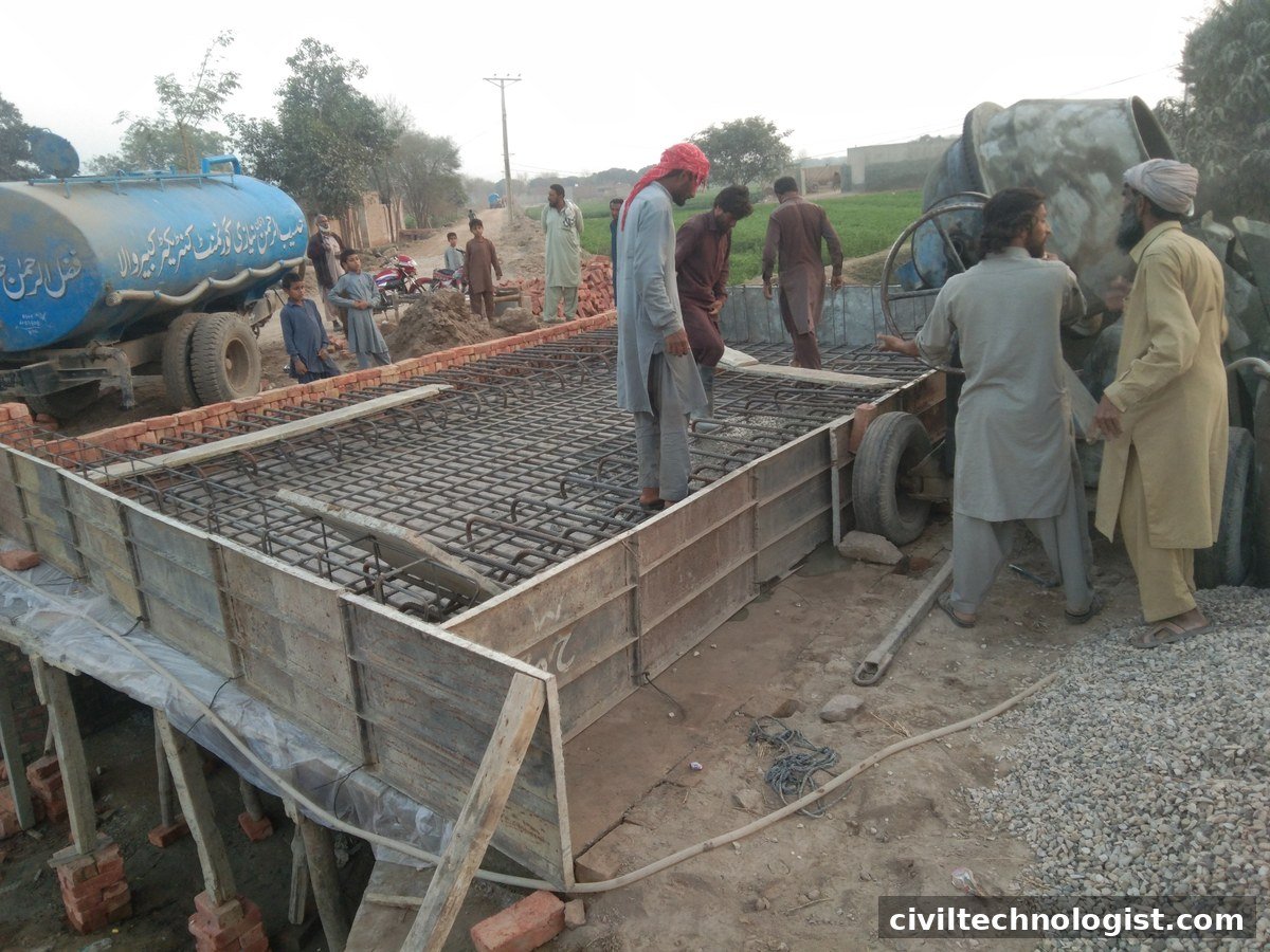 Bridge deck reinforcement being concreted with a site mixer